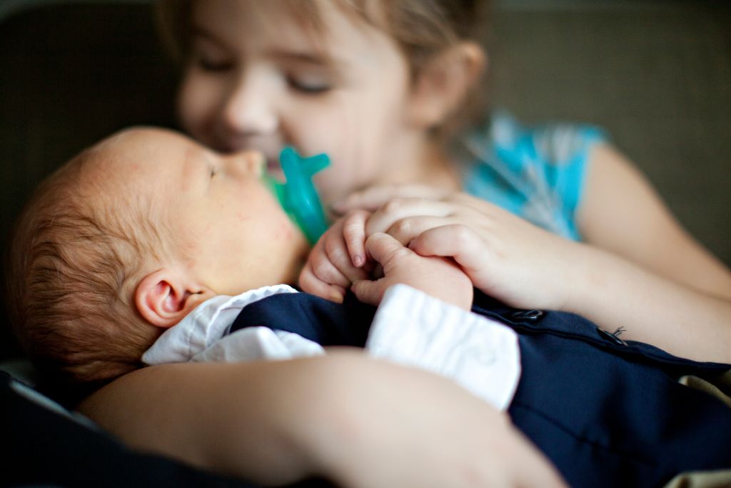 Helping your child cope with jealousy when a baby arrives